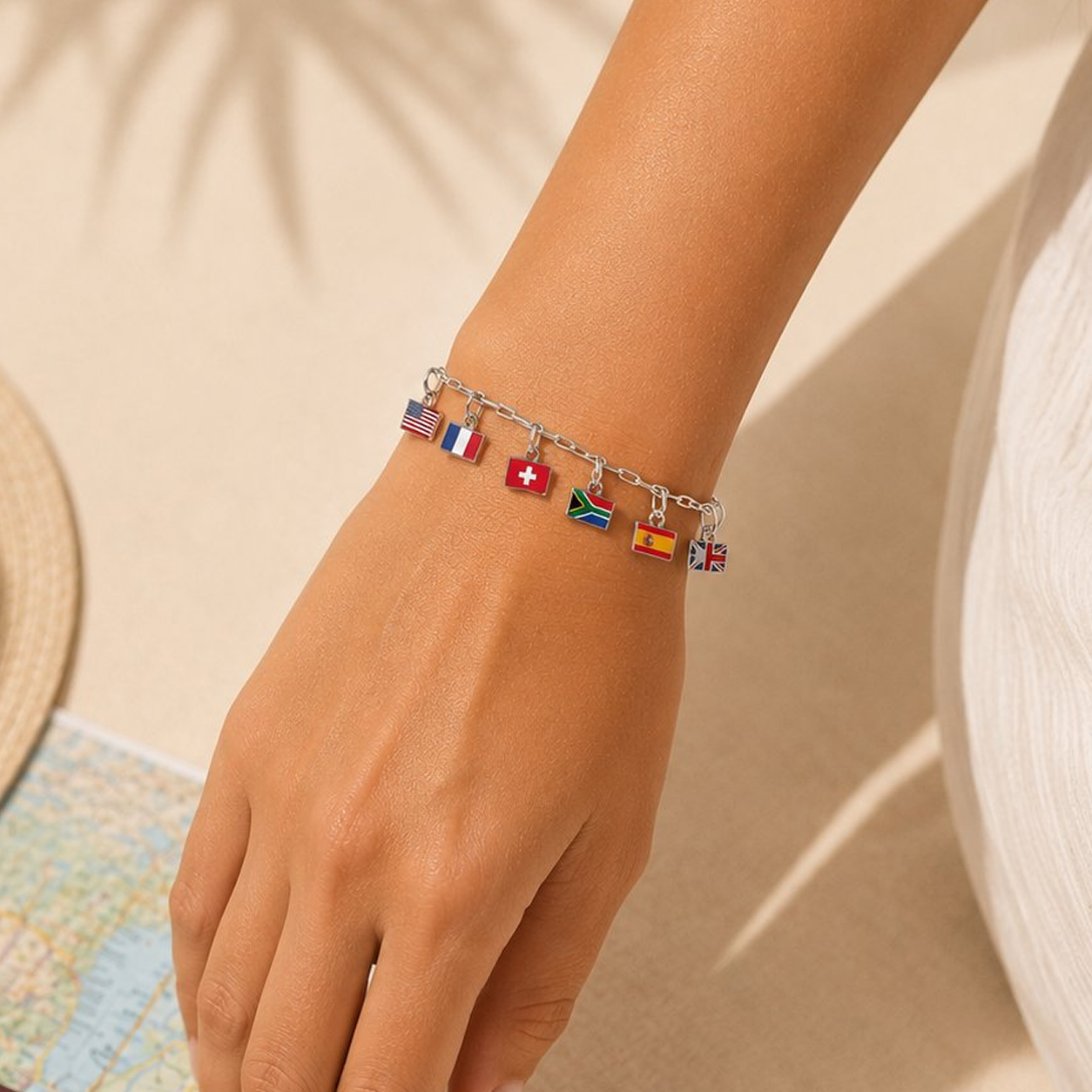 Silver charm bracelet with flag charms